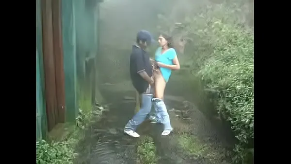 XXX Indian girl sucking and fucking outdoors in rain mega cev