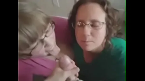 XXX Two amateur blowjob chicks receive cum on their face and glasses میگا ٹیوب
