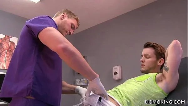 XXX Gay doctor sucking off his handsome patient mega trubice