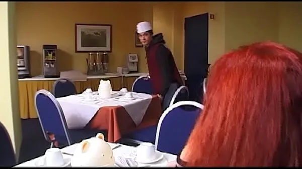 XXX Old woman fucks the young waiter and his friend أنبوب ضخم
