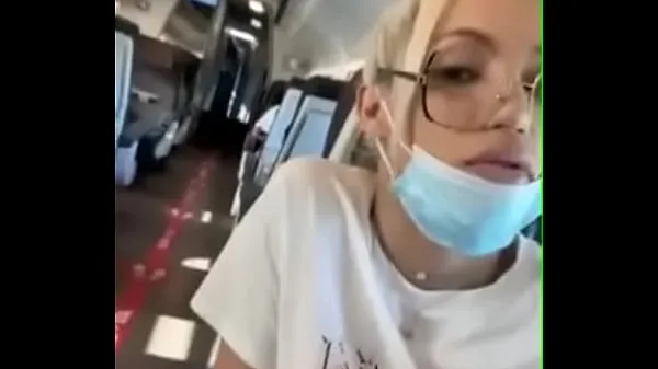 XXX Blonde shows his cock on the plane mega Tube