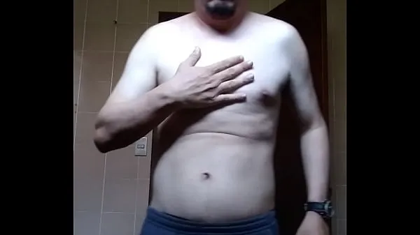 XXX shirtless man showing off mega Tube