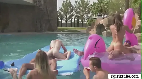 XXX Busty shemales are in the swimming pool with many guys that,they decide to do orgy and they start kissing each is,they suck their big cocks passionately and they let them bareback their wet ass too mega Tube